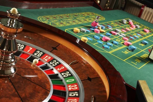Bikini Paradise live-dealer table with betting grid and player interaction points